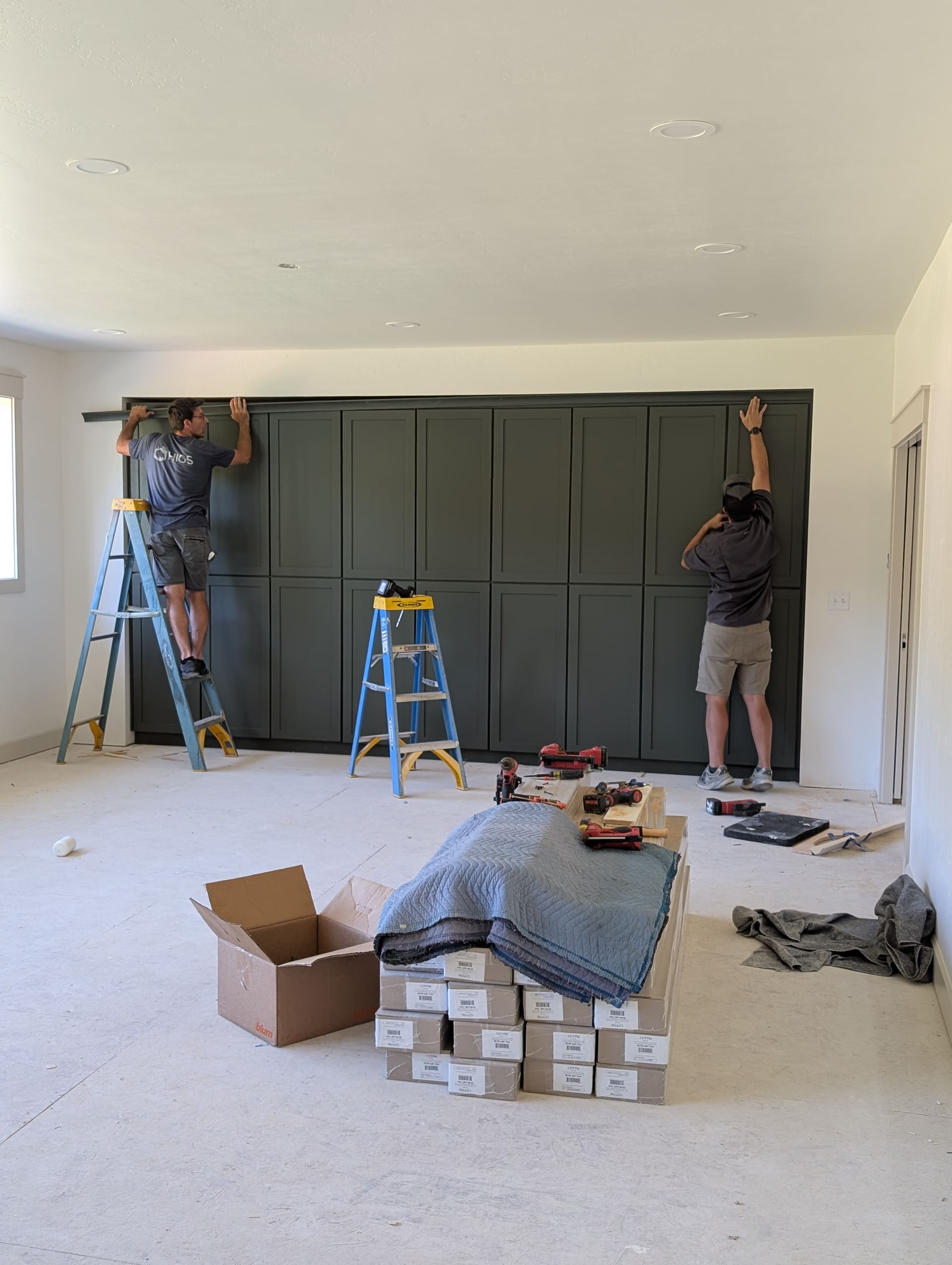 Installing a floor-to-ceiling wall of custom cabinetry